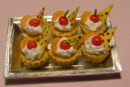 1 cherry and 1 slice orange and wafer