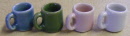 4 different coloured mugs