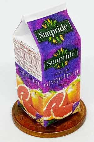 A Glass Filled With Orange Juice Is Shown With Two Slices Of Orange In Center Image320128456 - Foto 10